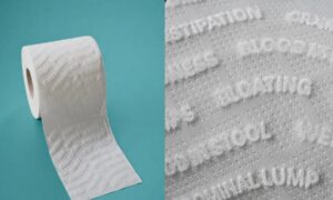 トイレットペーパーに貼られたこの広告は、ガンを可視化するために気づかれないようにしている。