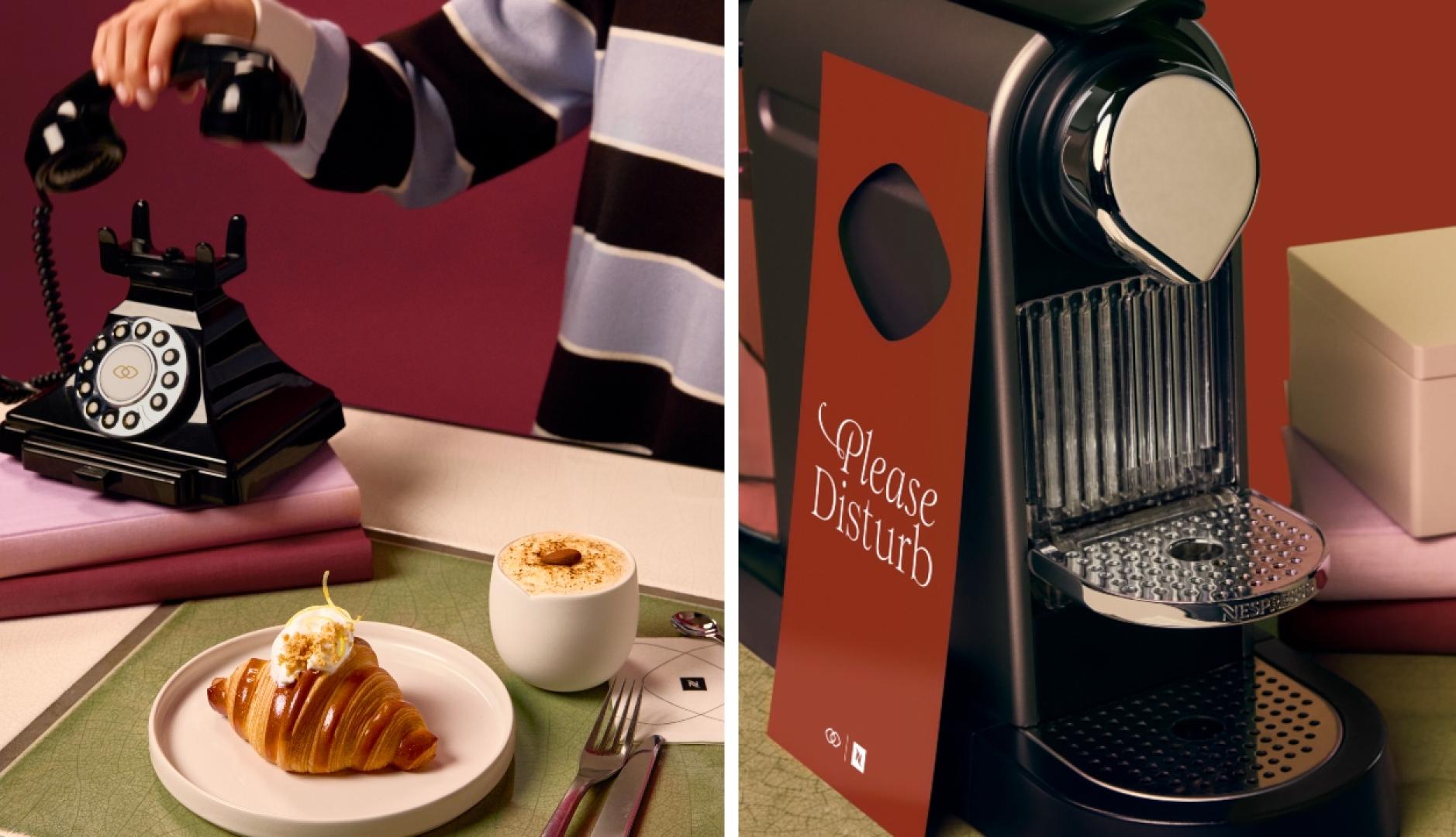 Un croissant, el café en un vaso y una cafetera de Nespresso con el cartel de molestar