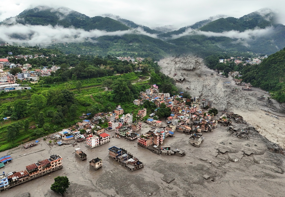 Drone photo of one of the affected towns next to the Trishuli river. Photo  Azwadafraz/Shutterstock